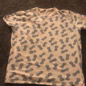 Peach shirt with navy blue pineapples